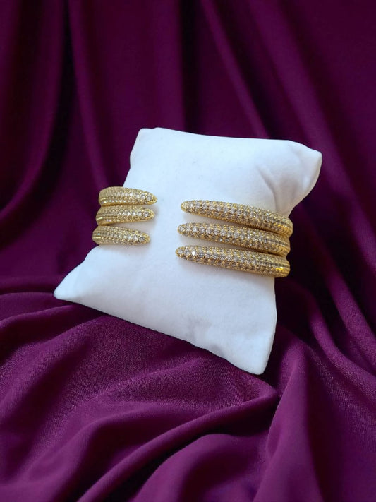 Brazalete con triple garra en zirconias