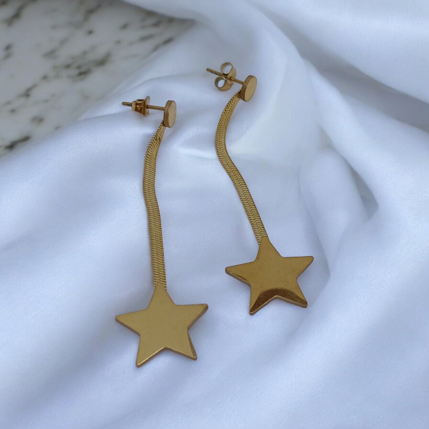 Aretes acero dorado