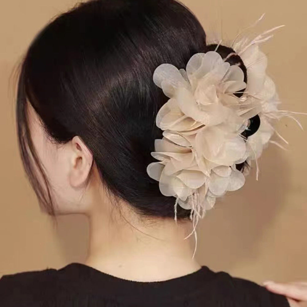 Prensa para cabello con diseño floral en cintas