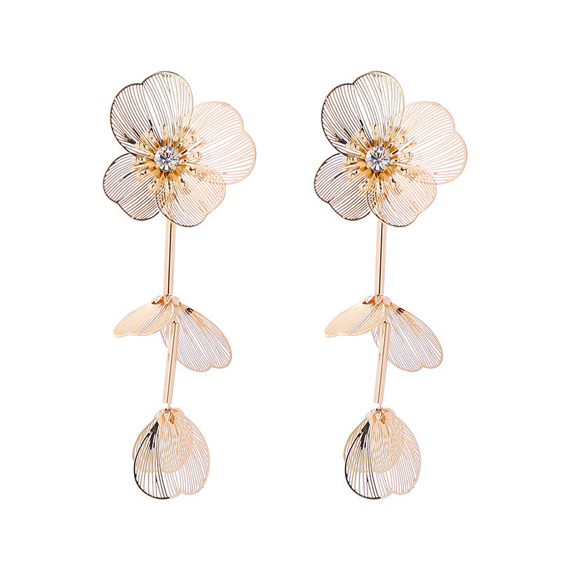 Aretes fantasía para evento de gala en diseño floral